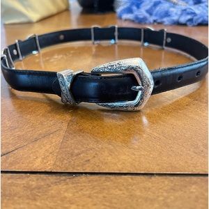 Brighton black leather belt with silver concho detail.